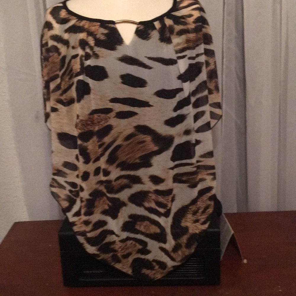 Woman’s Leopard Print Blouse